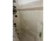 Compact bathroom shows tub and tile, with fixtures and fittings; may need updates at 221 Mission Newport Ln # 205, Las Vegas, NV 89107