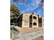 Charming two-story condo with private balconies and neat, low-maintenance landscaping at 221 Mission Newport Ln # 205, Las Vegas, NV 89107