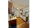 Functional kitchen with white appliances, wood-toned cabinets, and lots of counter space at 221 Mission Newport Ln # 205, Las Vegas, NV 89107