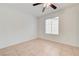 This bedroom features tile flooring and a window at 2377 Los Feliz St, Las Vegas, NV 89156