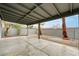 The covered patio provides an oasis in the stone landscaped backyard at 2377 Los Feliz St, Las Vegas, NV 89156