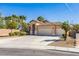 Charming single-story home featuring a three-car garage and well-maintained landscaping in a suburban setting at 250 Aspen Bay Ln, Henderson, NV 89012