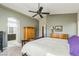 Serene main bedroom with walk-in closet, ceiling fan, and en-suite bathroom at 250 Aspen Bay Ln, Henderson, NV 89012