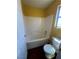 Clean secondary bath with tub and toilet, and single window for light at 2539 Early Light Dr, Las Vegas, NV 89142