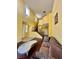 Bright living room with high ceilings, wood floors, staircase and ample natural light at 2539 Early Light Dr, Las Vegas, NV 89142