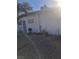 The front of this home has a barred front door and window, xeriscaping, and block wall at 2888 El Cajon St, Las Vegas, NV 89169