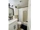 Bathroom featuring modern fixtures and a shower and tub combo with a white curtain at 2925 Wigwam Pkwy # 724, Henderson, NV 89074