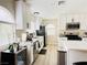 Contemporary kitchen with white cabinets, stainless appliances, and an beverage cooler at 2925 Wigwam Pkwy # 724, Henderson, NV 89074