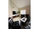 Comfortable living room with modern furniture, a large TV, and natural light at 2925 Wigwam Pkwy # 724, Henderson, NV 89074