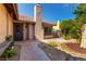 Inviting front porch featuring a bench, low-maintenance landscaping, and secure entrance at 3138 Valleywood Rd, Henderson, NV 89014