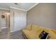 Bedroom with laminate flooring and a double-door closet for ample storage at 3266 Mountain Spring Rd, Las Vegas, NV 89146