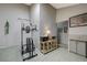 Large bonus room with tile floors, kitchenette area, and exercise equipment at 3266 Mountain Spring Rd, Las Vegas, NV 89146