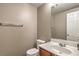 Cozy half bath featuring a pedestal sink, toilet, and a neutral color palette at 3568 Gloucester Gate St, Las Vegas, NV 89122
