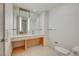 Modern bathroom with large mirror, sink, and toilet at 3726 S Las Vegas Blvd # 1003, Las Vegas, NV 89158