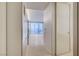 Hallway view showcasing the home's open layout, tile flooring, and city view through the living room at 3726 S Las Vegas Blvd # 1003, Las Vegas, NV 89158
