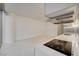 Kitchen showcases sleek cooktop, white countertops and modern finishes at 3726 S Las Vegas Blvd # 1003, Las Vegas, NV 89158