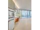 Modern kitchen with stainless steel appliances and large windows offering city views at 3726 S Las Vegas Blvd # 1003, Las Vegas, NV 89158