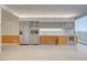 Large kitchen featuring modern appliances, sleek cabinets, and tile flooring throughout the room at 3726 S Las Vegas Blvd # 1003, Las Vegas, NV 89158