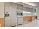 Close-up view of the kitchen appliances, featuring modern design and wood-paneled cabinets at 3726 S Las Vegas Blvd # 1003, Las Vegas, NV 89158