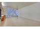 Bright living room with neutral tile flooring and floor-to-ceiling windows offering city views at 3726 S Las Vegas Blvd # 1003, Las Vegas, NV 89158