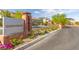 Queensbury community sign with flowers and trees around the area at 3817 Grazing Gazelle Ave, North Las Vegas, NV 89084
