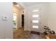 Entryway featuring tile floors and a view of a bathroom at 3817 Grazing Gazelle Ave, North Las Vegas, NV 89084