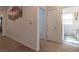 Hallway featuring carpet floors and a view of a bathroom at 3817 Grazing Gazelle Ave, North Las Vegas, NV 89084