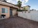The home's backyard features a brick patio and a stucco wall around the perimeter at 3934 Palos Verdes St, Las Vegas, NV 89119