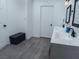 The bathroom features a double sink vanity, modern floors, fixtures and ample storage space at 3934 Palos Verdes St, Las Vegas, NV 89119