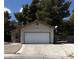 Charming single story home featuring a tile roof, two-car garage, and mature landscaping at 3948 Applecrest St, Las Vegas, NV 89108