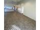 Spacious living room featuring tile flooring and access to other rooms at 3948 Applecrest St, Las Vegas, NV 89108