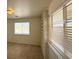 Bright bedroom featuring large windows and built-in shelving at 4330 Turner Blvd, Pahrump, NV 89061