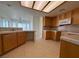 Classic kitchen with tile flooring and wood cabinets at 4330 Turner Blvd, Pahrump, NV 89061