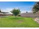 Expansive backyard with a covered patio, perfect for outdoor entertaining at 4428 Ash Ave, Las Vegas, NV 89110