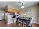Dining area adjacent to the kitchen, featuring a dining table and a breakfast bar at 4428 Ash Ave, Las Vegas, NV 89110