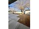 Large backyard features new concrete patio, mature trees, a storage shed, and desert landscaping at 5013 Vermont Ave, Las Vegas, NV 89107