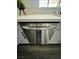 LG Stainless steel dishwasher with new light hardwood flooring at 5013 Vermont Ave, Las Vegas, NV 89107