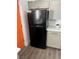 Modern kitchen features a new Frigidaire stainless steel refrigerator and gray cabinets at 5013 Vermont Ave, Las Vegas, NV 89107