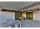 Backyard patio area with string lights, an outdoor table, and a foosball table at 5208 Overland Ave, Las Vegas, NV 89107
