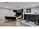 The bar area is adjacent to a seating area with a stone fireplace at 5208 Overland Ave, Las Vegas, NV 89107
