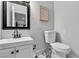 Bathroom with white vanity and commode at 5208 Overland Ave, Las Vegas, NV 89107