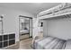 Bunk room with mirrored closet and modern decor for shared living spaces at 5208 Overland Ave, Las Vegas, NV 89107