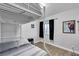 Bedroom features bunk beds, ample natural light, and modern wall art at 5208 Overland Ave, Las Vegas, NV 89107