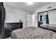 Bedroom features a large dresser and mirrored closet for ample storage at 5208 Overland Ave, Las Vegas, NV 89107