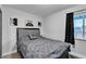 Comfortable bedroom with a window for plenty of light at 5208 Overland Ave, Las Vegas, NV 89107