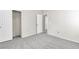Neutral bedroom with carpet, closet space, and an adjacent doorway at 5319 Farley Feather Ct, North Las Vegas, NV 89031