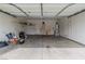Spacious garage with ample storage space and concrete flooring at 5319 Farley Feather Ct, North Las Vegas, NV 89031