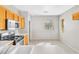 Bright kitchen with stainless steel appliances and wood cabinets at 5319 Farley Feather Ct, North Las Vegas, NV 89031