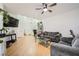 Open living space with neutral paint, modern furnishings, and ample natural light at 5853 Gentleslope St, Henderson, NV 89011