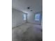 This bright bedroom features 2 windows with blinds and neutral carpeting throughout at 6158 Calm Breeze Ave # 101, Las Vegas, NV 89108
